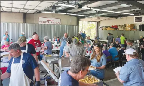  ?? Special to The Saline Courier ?? Friends of the Shaw Fire Department gather at last year’s fish fry. The department hosts this event each year to bring the community together.