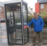  ??  ?? Concern Cllr Earl alongside threatened call box in South Church Street Callander