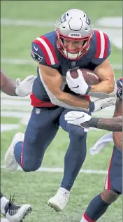  ?? AP ?? New England Patriots running back Rex Burkhead runs during the second half against the Las Vegas Raiders on Sunday at Gillette Stadium.