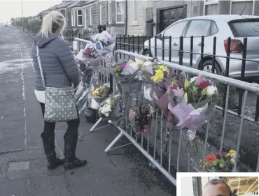  ??  ?? 0 Well-wishers left tributes yesterday at the scene where biker David Mcgarvey, 28, crashed into a parked Saab and was killed