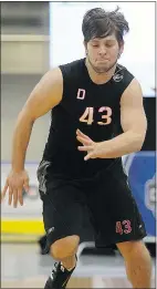  ??  ?? Jakub Zboril performs an agility test June 6 during the NHL combine in Buffalo. The Canucks would love to snap him up, too.