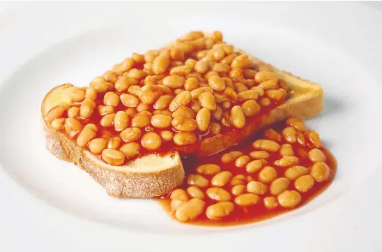  ?? ?? TUCK IN: Beans on toast may be a popular choice of food, but for good wellbeing people need a diet that is low in salt and sugar.