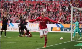  ?? Photograph: Matthias Schräder/AP ?? Ludovic Ajorque celebrates scoring Mainz's equaliser as Bayern Munich appeal in vain.