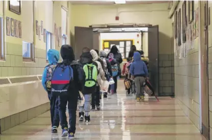 ?? ASHLEE REZIN GARCIA/SUN-TIMES ?? With schools gearing up to welcome back students, here’s what parents and teachers had to say.