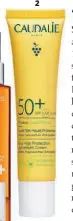  ?? ?? 2 1. Clarins L’Eau-en-Brume Solaire SPF 50+ (32,50 €). 2. Caudalie Fluido de Muy Alta Protección SPF 50+ Vinosun (23,50 €).