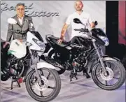  ?? PTI ?? Hero Moto MD and CEO Pawan Munjal (left) with the company’s head of global product planning, Malo Le Masson, at the launch of Hero Achiever 150 in Gurgaon on Monday