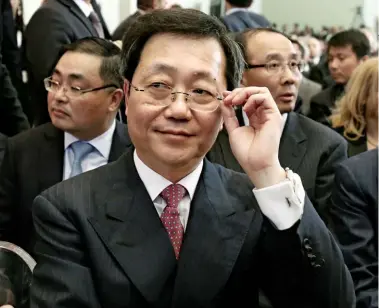  ?? ?? REACH COSCO chairman Xu Lirong AFTER THE SIGNING OF THE 2016 DEAL THAT GAVE THE STATE-OWNED COMPANY CONTROL OF THE GREEK PORT OF PIRAEUS.