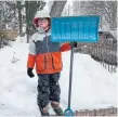  ?? RACHEL DISAIA ?? Carter Trozzolo, 9, used a shovel to clear sidewalks in a feat that made him a social media star.