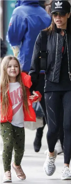  ??  ?? Fashioning a future: Harper with her mother Victoria