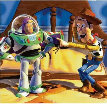  ??  ?? Die beiden Helden von „Toy Story“: Buzz Lightyear (links) und Woody sind am Anfang Konkurrent­en, doch sie werden zu Freunden – und 1995 zu Pionieren des digital animierten Kinos