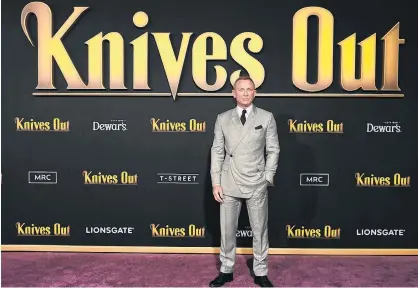  ?? REUTERS/PHIL MCCARTEN ?? Cast member Daniel Craig attends the premiere of “Knives Out” in Los Angeles on Nov. 14, 2019.