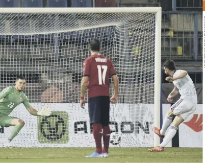  ??  ?? 0 Ryan Christie converts his second-half penalty, which proved to be the winning goal in Olomouc.