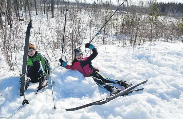 ?? PHOTOS: ANDREA HILL ?? Practise is key to all sports, including skiing, as Lachlan Andrews, left, and Amila Andrews have fun discoverin­g.