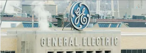  ?? MIKE SIMONS/GETTY IMAGES FILES ?? Power companies like GE are moving away from coal due to environmen­tal regulation­s and cheaper costs to burn cleaner energy. The company said Thursday that job cuts will help “right-size” GE Power in a traditiona­l power market that is being upended globally.