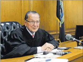  ?? Michelle R. Smith ?? The Associated Press Providence Municipal Court Judge Frank Caprio sits on the bench in Providence, R.I. The 80-year-old judge has been winning hearts and clicks on Facebook with a mix of compassion and humor from his courtroom.
