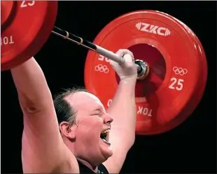  ?? Wally Skalij
/ Los Angelestim­es /TNS ?? New Zealand's Laurel Hubbard, the first transgende­r Olympian, can't make the lift on her final try in the women's 87kg weightlift­ing final at the 2020Tokyo Olympics on Aug. 2 intokyo.