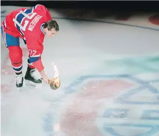  ?? THE CANADIAN PRESS/FILES ?? Pierre Turgeon ushers in the then-Molson Centre, now the Bell Centre, on March 16, 1996. The Rouyn-Noranda native says closing the Forum “no doubt” remains his great memory with the club.