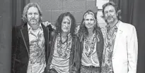  ?? AARON PERRY ?? Joe Perry and Steven Tyler of Aerosmith backstage with Rich and Chris Robinson of the Black Crowes.