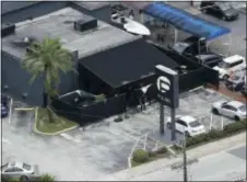  ?? CHRIS O’MEARA — THE ASSOCIATED PRESS FILE ?? In this file photo, law enforcemen­t officials work at the Pulse gay nightclub in Orlando, Fla., following a mass shooting. A California judge is deciding whether to release the widow of the gunman, Omar Mateen, who killed dozens of people at the...