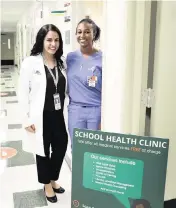  ?? ALIE SKOWRONSKI askowronsk­i@miamiheral­d.com ?? Dr. Elizabeth Pulgarón, Director of Mental Health Services, left, and Dr. Margia Ambroise, licensed medical doctor at high school clinics, inside the clinic at North Miami High School.