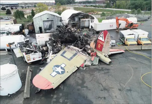  ?? Associated Press ?? Wreckage from a World War II-era B-17 bomber that crashed on Oct. 2, 2019, at Bradley Internatio­nal Airport in Windsor Locks. Pilot error was the probable cause of the 2019 crash that killed seven people and wounded six others, the NTSB said in a report released Tuesday that also cited inadequate maintenanc­e as a contributi­ng factor.