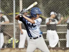  ?? Courtesy photo ?? Kanale Kuloloia of the Maui Pony League All-Stars bats during the state tournament last month. The team is headed to the Pony West Zone Tournament, set for Aug. 1-4 in West Hills, Calif.