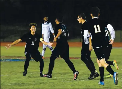  ?? CHRIS RILEY — TIMES-HERALD, FILE ?? Bethel High’s Rogelio Pablo, center, celebrates his goal with Julio Escobar, left, during the Jaguars’ 3-0 win over Hercules in 2019.