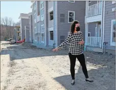  ?? SARAH GORDON THE DAY ?? Jessica Gebbie, with Pledge Property Management, gives a tour of the new Westledge Apartments in Norwich Thursday. Phase one of the complex, which will in total have over 100 units, is scheduled to open to residents in May.