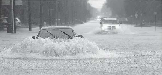  ?? DAN JANISSE ?? On Sept. 29, a major rainstorm in Windsor and area saw streets turn into rivers and 3,000 homes flooded. Overall, $110 million in insurance claims were filed.