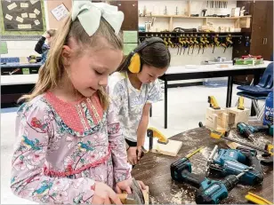  ?? COURTESY ?? Students at Mountain Park Elementary in Roswell recently showcased their skills to visiting building contractor­s. “We wanted contractor­s to see the journey students take that can lead, in some cases, into the workforce. They were blown away by what they saw,” said Zach Fields, a teacher at Roswell High.