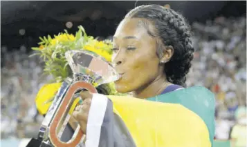  ?? (photo: afp) ?? Jamaica’s Elaine Thompson-herah celebrates after winning the women’s 100m event of the IAAF Diamond League athletics meeting “Weltklasse” in Zurich, Switzerlan­d, in meet record 10.65 seconds in this September 9, 2021 file photo.