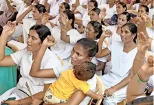  ?? B. JOTHI RAMALINGAM ?? Nurses staging a protest in Chennai on Friday.