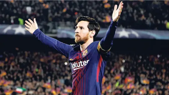  ??  ?? Barcelona’s Lionel Messi celebrates after scoring his side’s third goal during the Champions League round-of-16, second-leg match against Chelsea at the Camp Nou stadium in Barcelona yesterday.