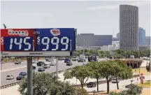  ?? Elias Valverde II/Dallas Morning News ?? A billboard advertises Powerball and Mega Millions lottery jackpots in 2022 along Interstate 35 in Dallas.