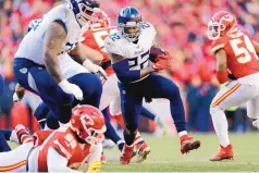  ?? JEFF ROBERSON/ASSOCIATED PRESS ?? Tennessee Titans running back Derrick Henry was held to 69 yards on 19 carries after rushing for 588 yards in the past three games. He finished the second half with seven yards on four carries.