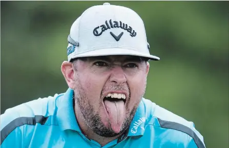  ?? FRANK GUNN THE CANADIAN PRESS ?? Robert Garrigus reacts to his tee shot on the 17th hole of at the Canadian Open golf tournament at Glen Abbey in Oakville on Thursday.