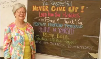  ?? CAROL ROLF/CONTRIBUTI­NG PHOTOGRAPH­ER ?? Sharon Green has been teaching for 52 years, most of those years in the Mayflower School District, where she posts encouragin­g words on this blackboard for her students. Green plans to spend today with her children and their families, attending services at Mayflower United Pentecosta­l Church, then enjoying lunch somewhere special.