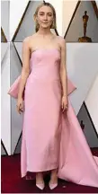  ??  ?? Saoirse Ronan is certainly pretty in pink.