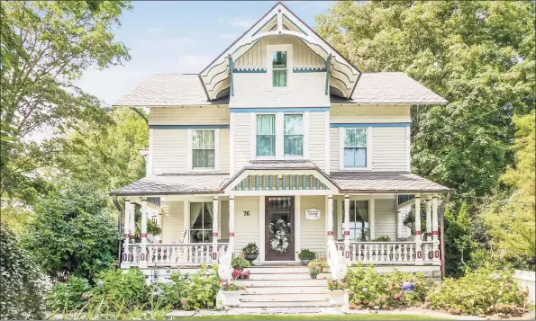  ?? Contribute­d photos ?? This charming home, which was the recipient of the Westport Historic Preservati­on Award, features six fireplaces and extensive original decorative millwork.