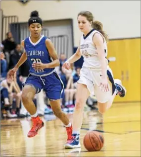  ?? NATE HECKENBERG­ER — FOR DIGITAL FIRST MEDIA ?? West Chester Rustins’ Lexi Zavitsky drives against Academy Park’s Mahya Woodton during Tuesday’s District 1 playoff game.