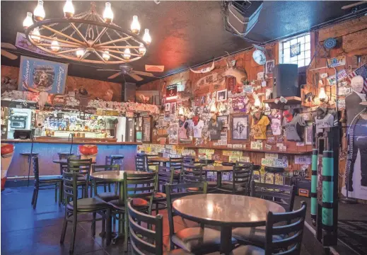  ?? PHOTOS BY DRAKE PRESTO/THE REPUBLIC ?? The interior of the Rusty Spur Saloon is shown on May 13 in Scottsdale.