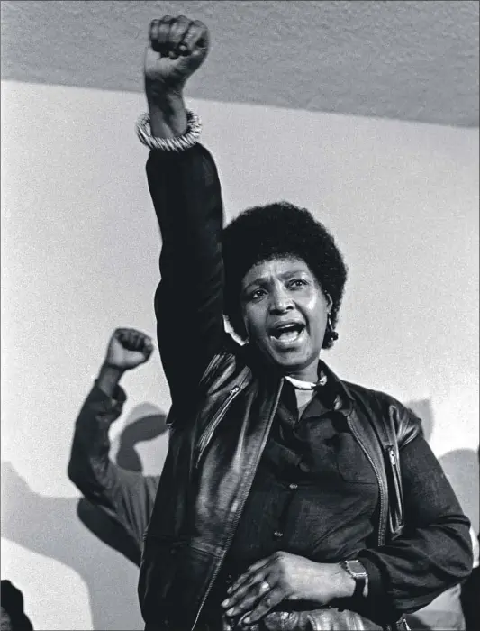  ??  ?? Portrait of power: Winnie Mandela with clenched fist is a common image, but does it really capture this complex woman? Photo: Gille de Vlieg