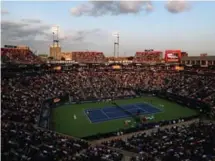  ?? RONALD MARTINEZ/GETTY IMAGES ?? The sun sets over the former Rexall Centre, now Aviva Centre, at York University during the Rogers Cup last August.