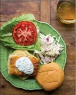  ?? Katie Workman via AP ?? Fried halibut fish sandwich. This dish is from a recipe by Katie Workman.
