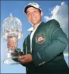  ?? JARED C. TILTON, GETTY IMAGES ?? Xander Schauffele poses with the trophy after his victory.