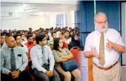  ??  ?? Orientatio­n programme of ACHE - Prof. Craig R. Gardner, the Head of the Department of English addressing the recently enrolled students.