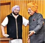  ??  ?? Punjab Chief Minister Captain Amarinder Singh with Rana Kanwarpal Singh after he took oath as Speaker of State Assembly at Raj Bhawan in Chandigarh on Monday