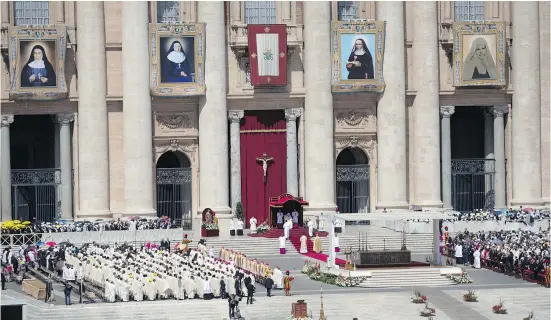 ?? ALESSANDRA TARANTINO/THE ASSOCIATED PRESS ?? Pope Francis celebrates a canonizati­on ceremony of four new saints, all nuns, in St. Peter’s Square at the Vatican on Sunday. They included Mariam Baouardy and Marie-Alphonsine Ghattas, who both served in 19th-century Palestine.