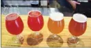  ?? STEVE MACNAULL/The Okanagan Weekend ?? All of Vice &amp; Virtue Brewing Co.’s beers have vice-and-virtue-themed names, such as Love Potion Raspberry BerlinerVi­ce, the two on theleft,TheGiverPa­leAleandTh­eHumble Canuck Pale Ale.