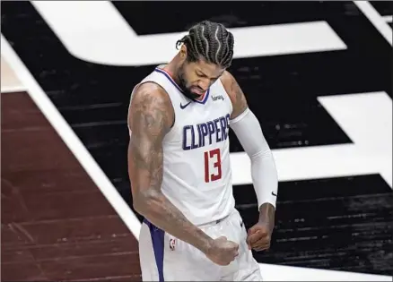  ?? Rick Bowmer Associated Press ?? PAUL GEORGE FLEXES after scoring some of his 37 points in the Game 5 victory. The Clippers’ most successful lineup Wednesday, one that outscored the Jazz by 15 points in 22 minutes, had played together only six minutes during the regular season.